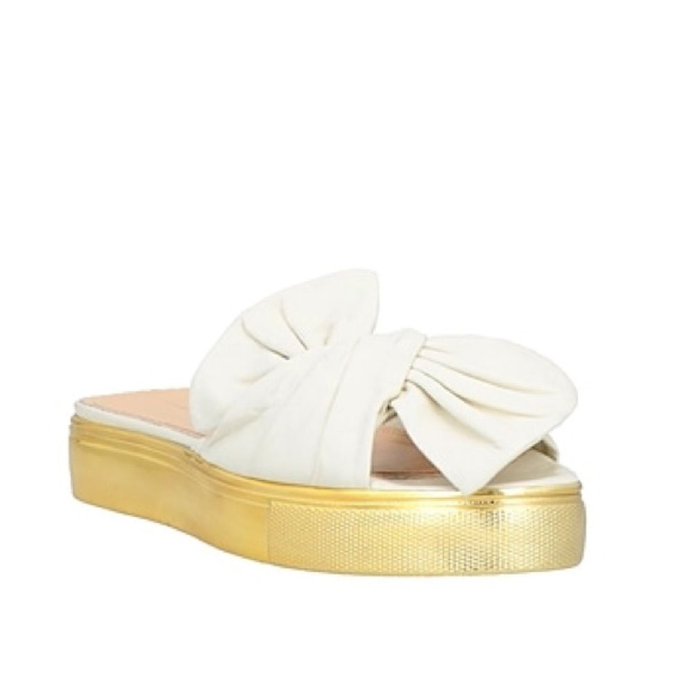 Revolve Charlotte Olympia Ivory and Gold Leather Knotted Bow Sandals